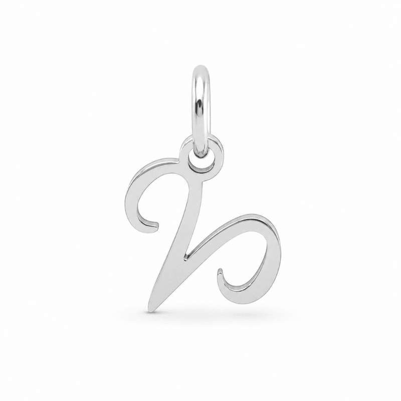 Les Paulinas, charm astrologique Bélier argenté en acier inoxydable Charm astrologique Bélier argenté en acier inoxydable représentant le symbole du signe du zodiaque, pour bijou personnalisable Les Paulinas