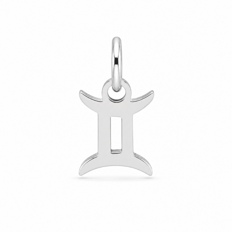 Les Paulinas, charm astrologique Gémeaux argenté en acier inoxydable Charm astrologique Gémeaux argenté en acier inoxydable représentant le symbole du signe du zodiaque, pour bijou personnalisable Les Paulinas