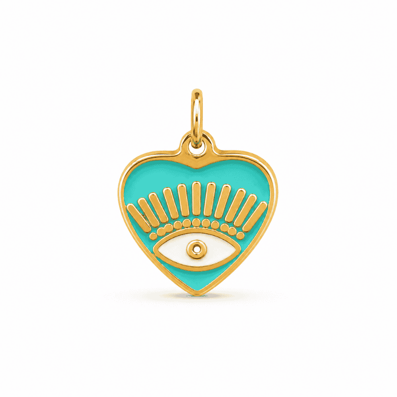 Photographie produit sur fond blanc d'un charm croix fine doré en acier inoxydable. Le pendentif représente une croix aux lignes épurées et élégantes. Sa finition dorée brillante met en valeur la finesse du design et apporte une touche lumineuse. Ce charm est idéal pour personnaliser un bijou Les Paulinas. Charm cœur œil turquoise doré en acier inoxydable, pendentif protecteur pour bijou personnalisable Les Paulinas