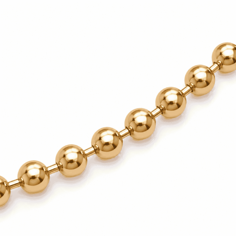 Les Paulinas, zoom sur la chaîne du collier Paulina Audacieuse doré Zoom sur la maille à boules en relief du collier Paulina Audacieuse doré en acier inoxydable Les Paulinas