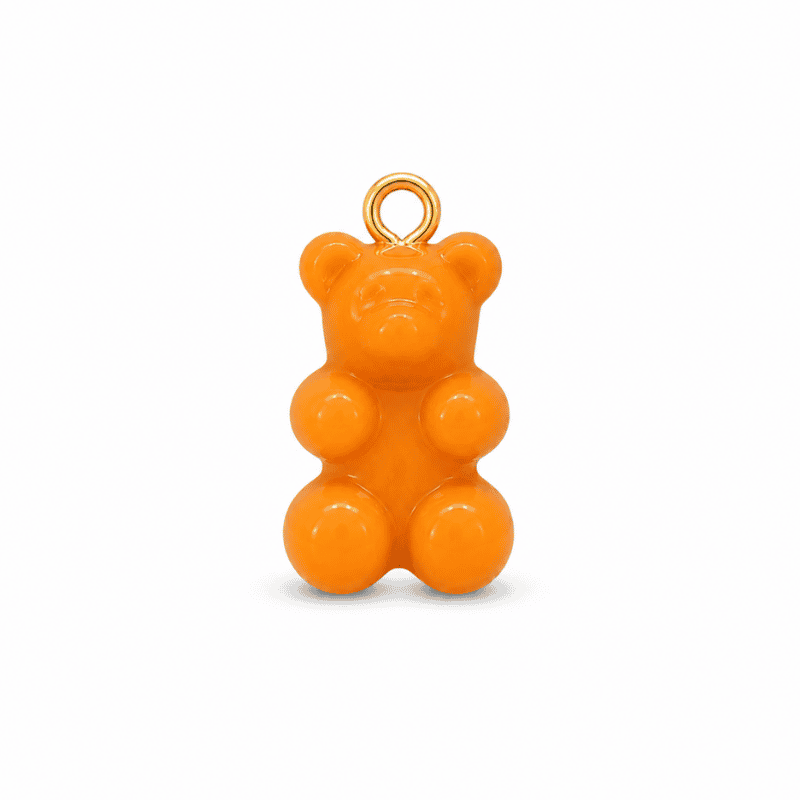 Les Paulinas, charm nounours opaque orange doré en acier inoxydable Charm nounours opaque orange avec anneau doré en acier inoxydable, pour bijou personnalisable Les Paulinas